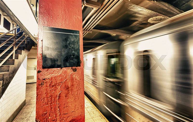 City subway with fast moving train, stock photo