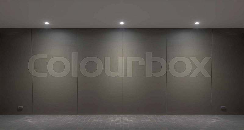 Lights wall and floor from lamp on the black wall background, stock photo
