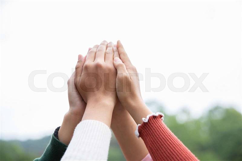 Young group are join hands for working the job success , Hands, symbolizing the hands to unity and teamwork ,success ,helps , business concept. , stock photo