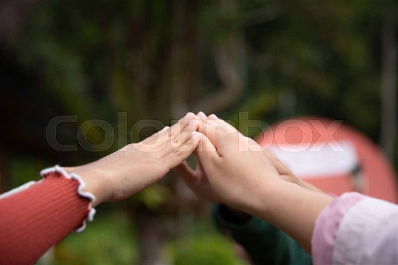 Young group are join hands for working the job success , Hands, symbolizing the hands to unity and teamwork ,success ,helps , business concept. , stock photo