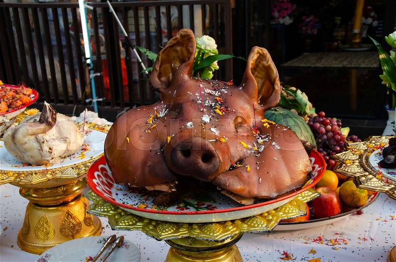 Pig head for praying and sacrifice, stock photo