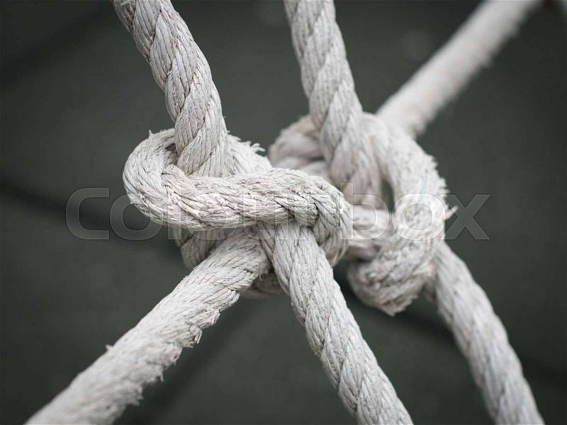The old rope knot for net climbing, closeup of rope knot , stock photo