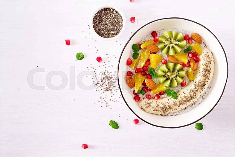 Fitness food. Delicious and healthy chia pudding with banana, kiwi and chia seeds. Healthy breakfast. Fitness food. Proper nutrition. Flat lay. Top view, stock photo