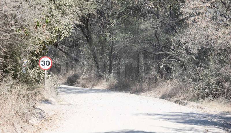30KM sign road signal on a dirtroad in Botswana, stock photo