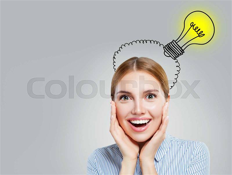 Happy girl with lightbulb. Brainstorm, ideas, problem and solution concept, stock photo