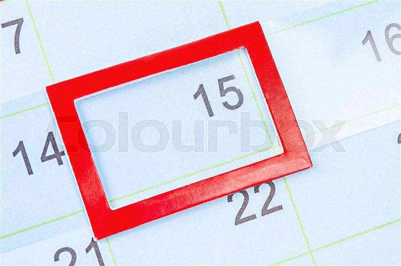 Red square mark at the 15th on blank calendar for your message or text, stock photo