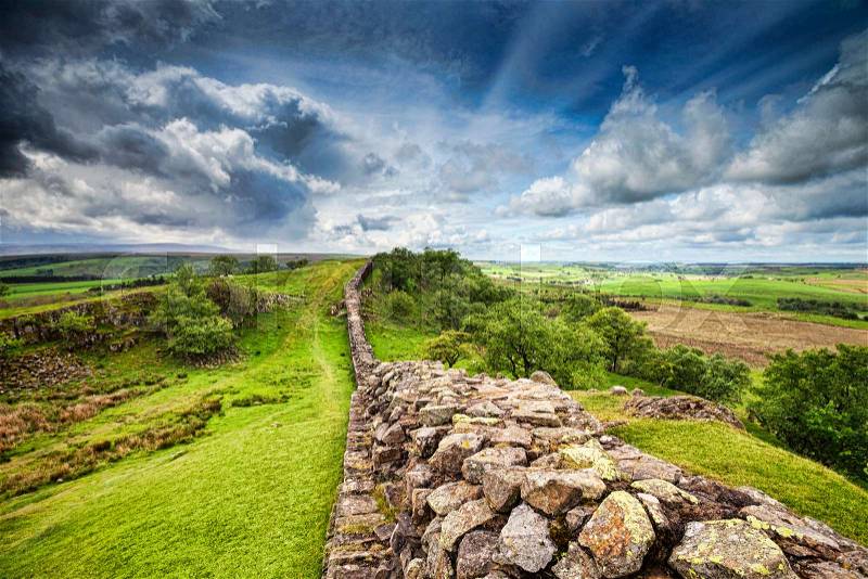 Hadrian\'s Wall, the 2000 year old wall built by the Roman Emporor Hadrian to keep the Scots out of England, stock photo