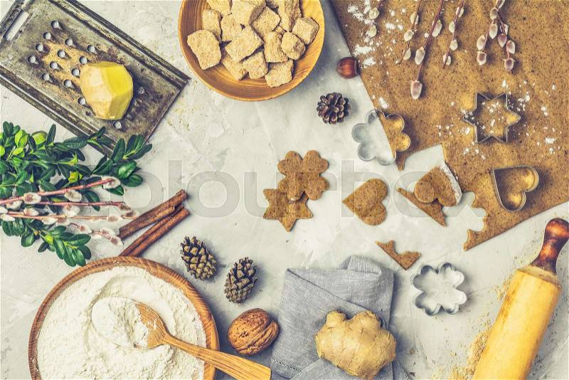 Culinary Spring or Christmas food background. Ingredients for ginger cookies. Dough for baking, brown sugar, flour, eggs. View from above, stock photo