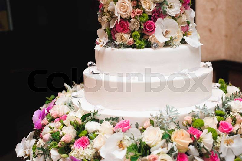 Wedding details - tasty wedding cake dessert with decoration, stock photo
