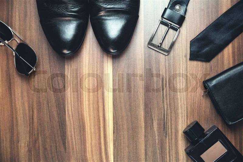 Men\'s accessories on the wood background, stock photo