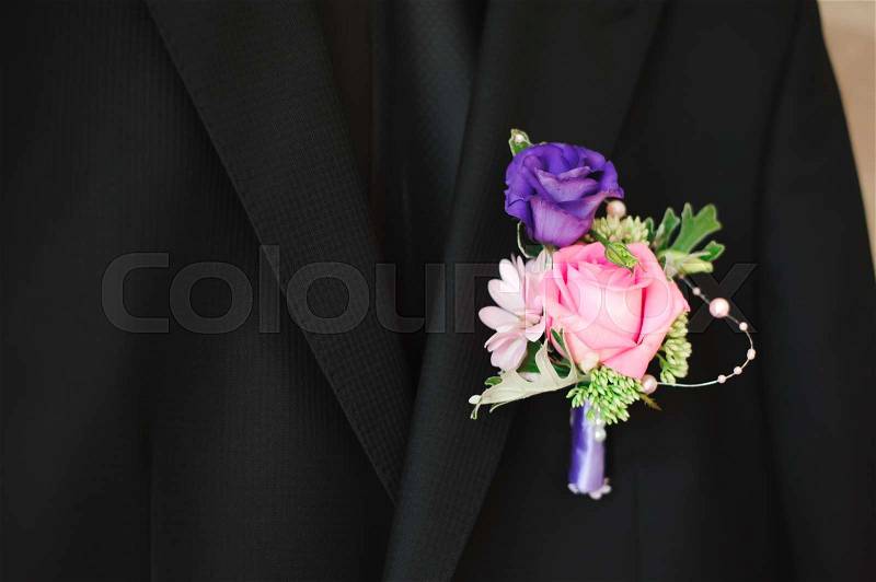 Wedding details - elegant groom dressed wedding tuxedo costume is waiting for the bride, stock photo