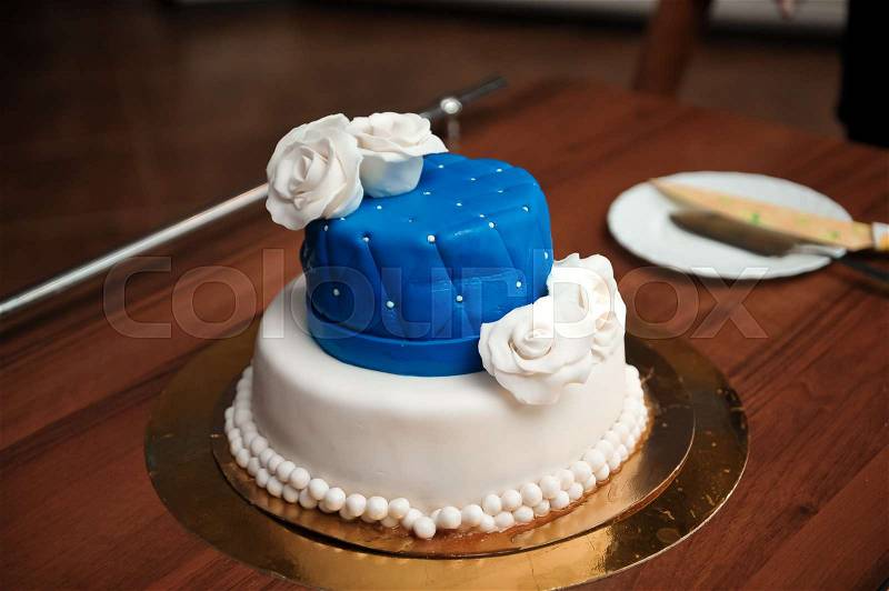 Wedding details - wedding cake dessert with flowers as decor, stock photo