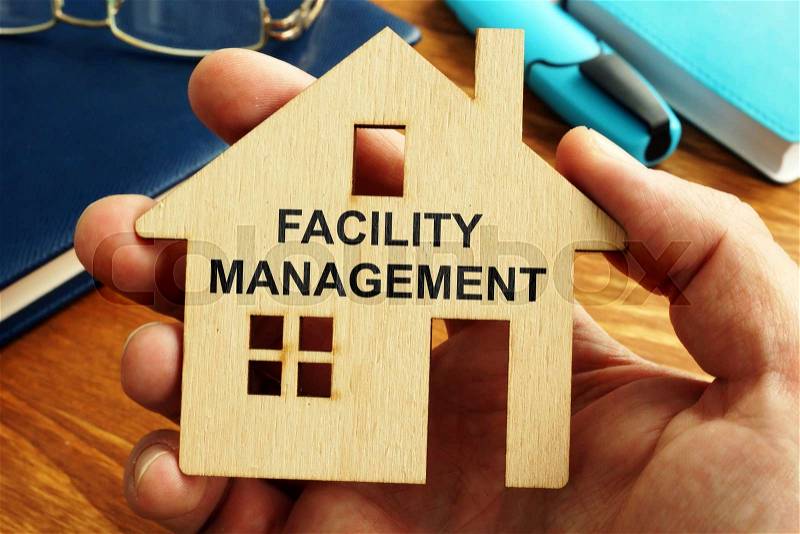 Facility management written on the small house, stock photo
