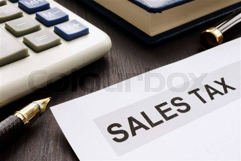 Sales tax. Papers on the office table, stock photo