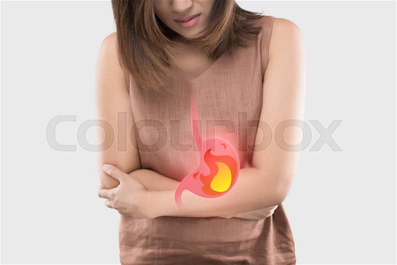 Acid reflux or Heartburn, The photo of stomach is on the woman\'s body against gray Background, Bad health, Female anatomy concept, stock photo