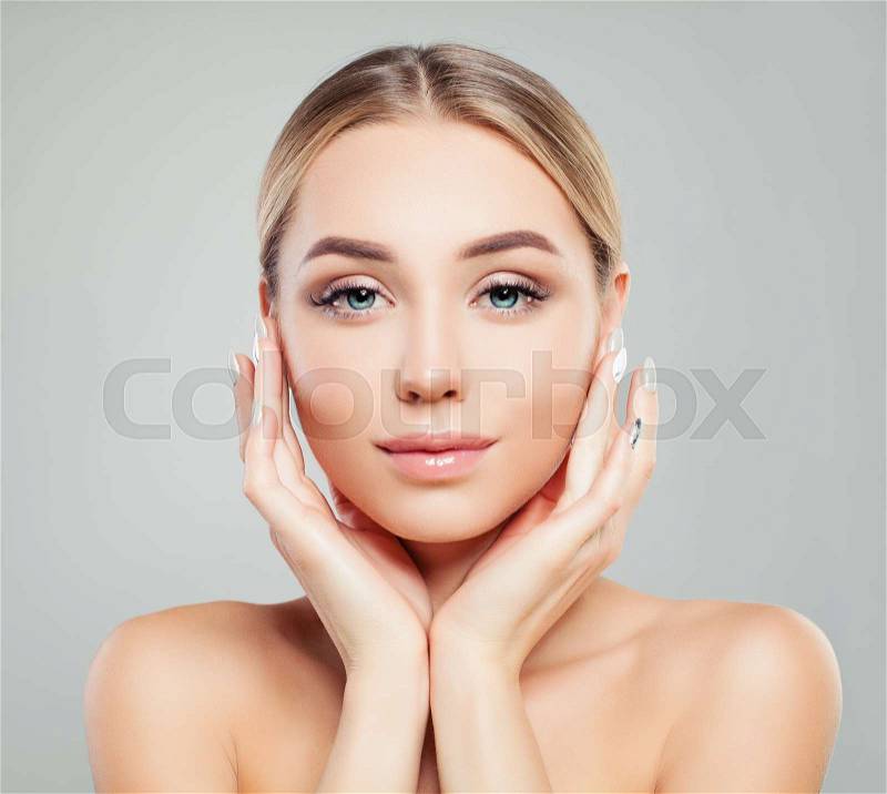 Young perfect female face. Perfect girl with healthy skin. Facial treatment, skincare and cosmetology concept. , stock photo