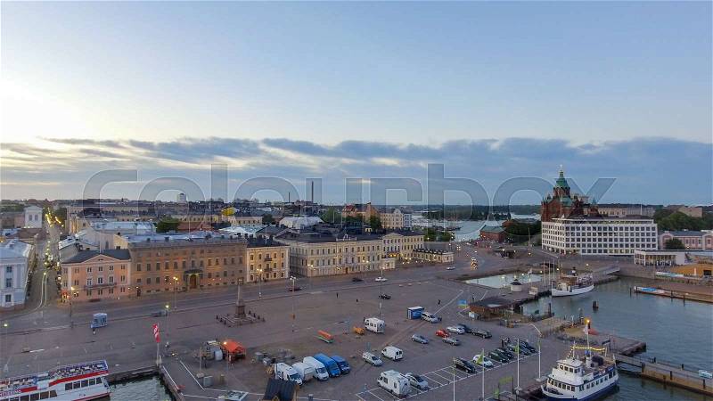HELSINKI, FINLAND - JULY 2017: Aerial view of city skyline at dusk, stock photo