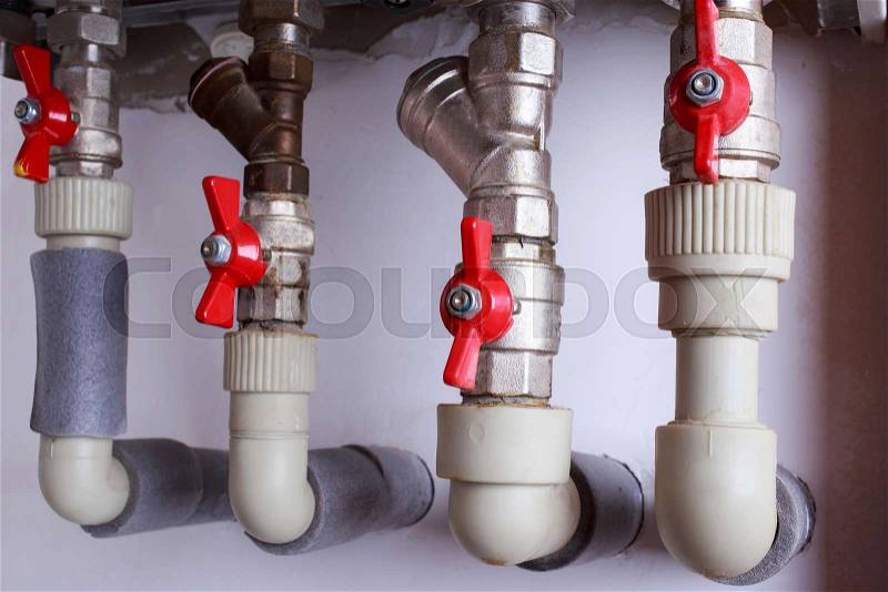Water heater system with taps a close-up, stock photo