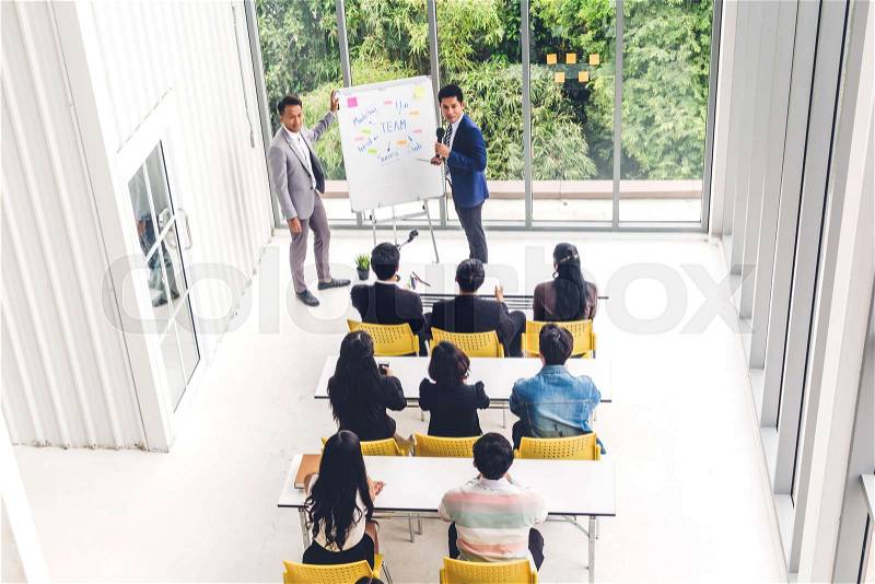 Group of casual business meeting and discussing with laptop computer.creative business people presenting and planning in modern workloft.Teamwork concept, stock photo