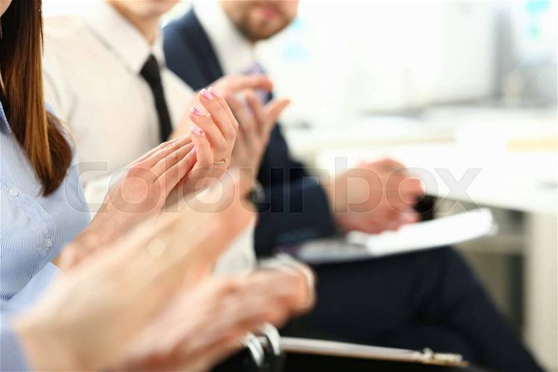 Group of people clap their arm in row during seminar closeup. Great news brief achievement win deal good job happy birthday employee introduce party positive welcome ..., stock photo
