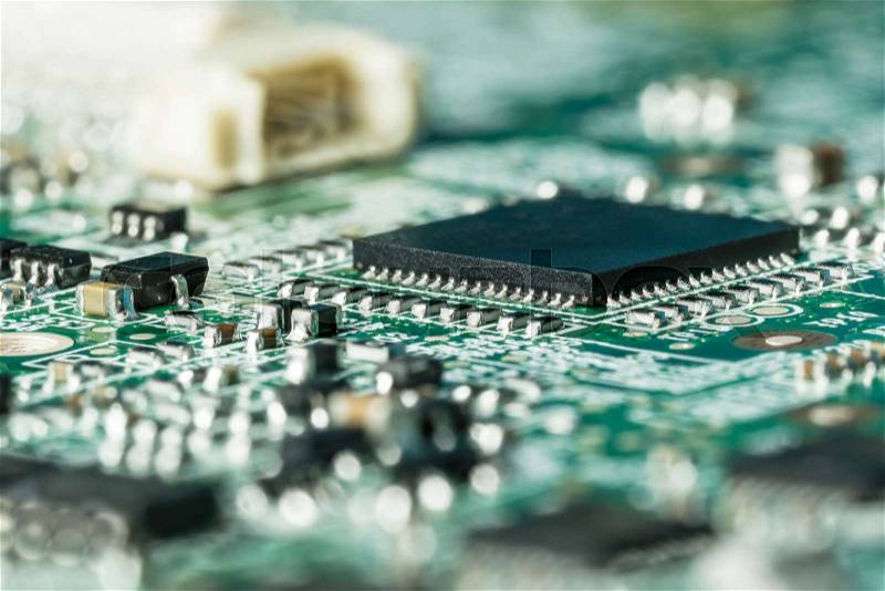 Close up macro of a surface mounted curcuits board with components, stock photo