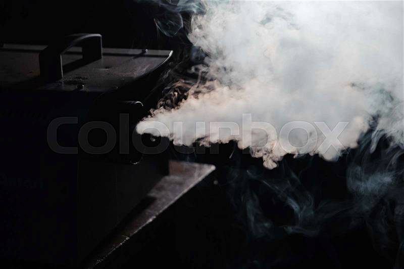 Lights in smoke, studio lights shining through the smoke from smoke machine, stock photo