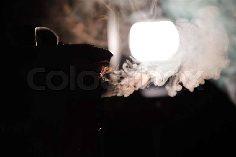Lights in smoke, studio lights shining through the smoke from smoke machine, stock photo