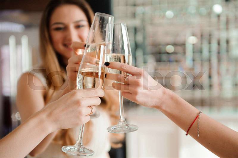 Group people with champagne dancing at the party, stock photo