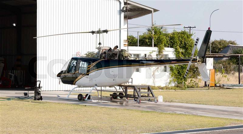 Helicopter maintenance in the open air - Botswana, stock photo