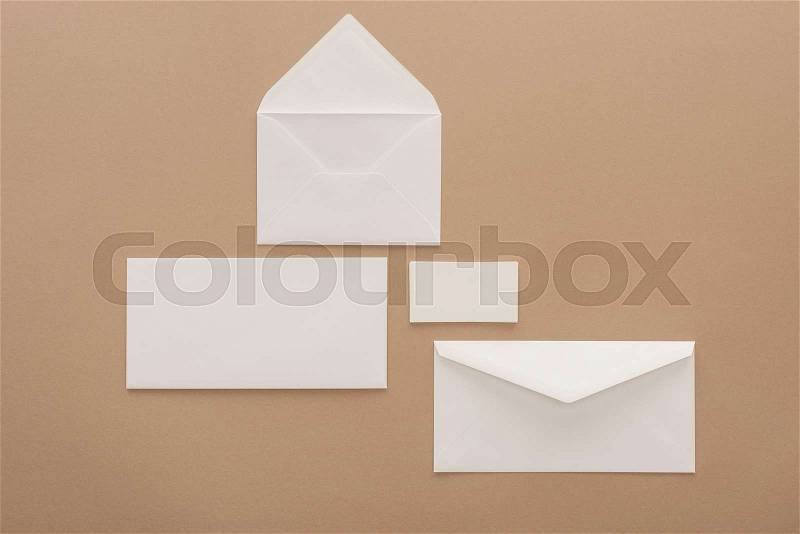 Top view of envelopes, cards and sheet of paper, stock photo