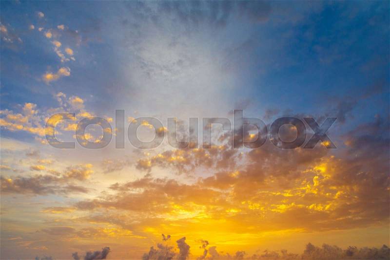 Sunset with sun rays, sky with clouds and sun, stock photo