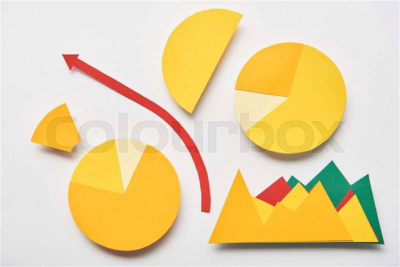 Top view of paper charts and graphs, pointer on white background, stock photo