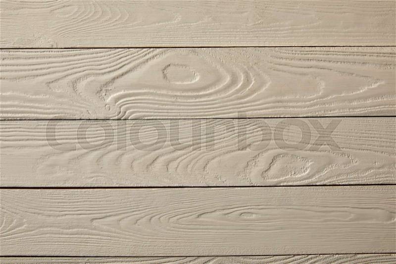 Top view of white desk surface with wooden texture, stock photo