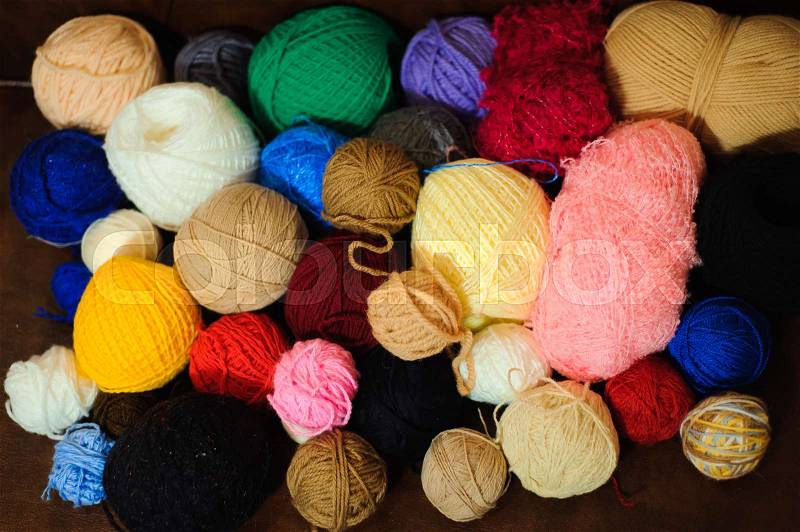 Colored balls of yarn. View from above. Rainbow colors. All colors. Yarn for knitting. Skeins of yarn, stock photo
