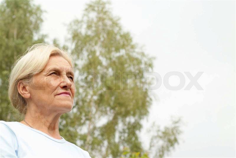 Woman stands on the sky, stock photo