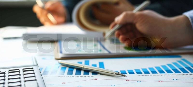 Financial statistics documents ball pen infographics at office table closeup. Internal Revenue Service inspector sum check investigation exchange market earnings ..., stock photo