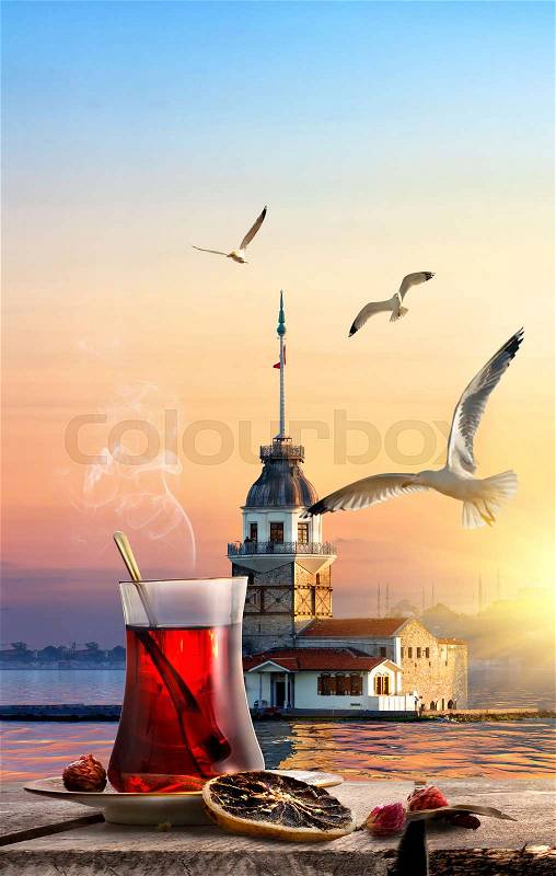 Traditional turkish tea and famous Maiden Tower in Istanbul, stock photo