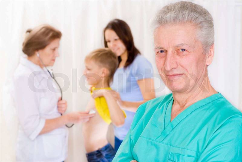 Doctor and family, stock photo