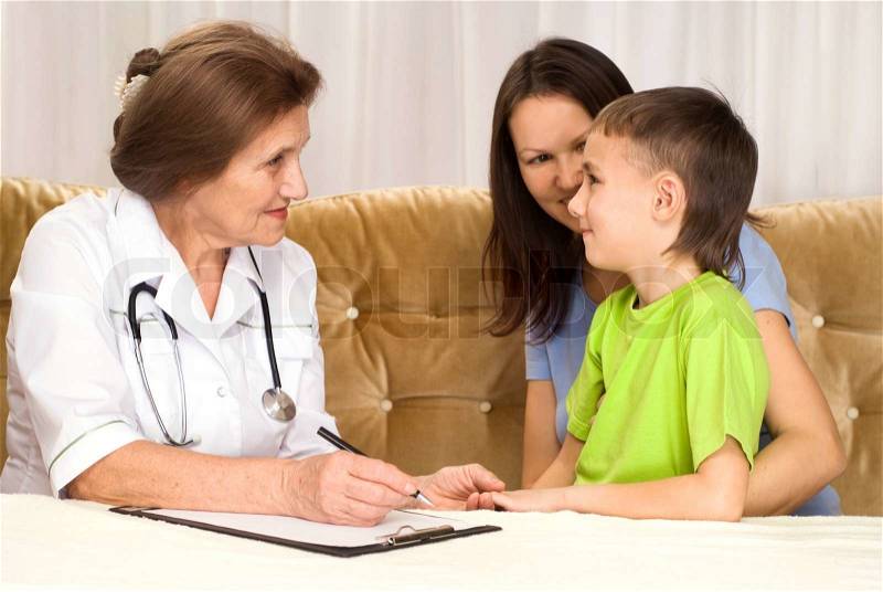 Doctor and mom with a boy, stock photo