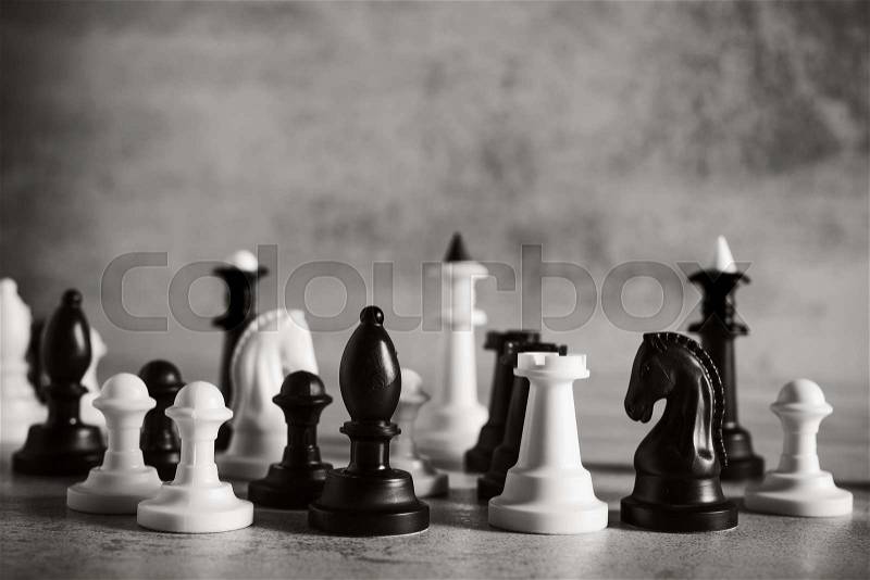Chess board game on a stone background. chessboard battle, stock photo