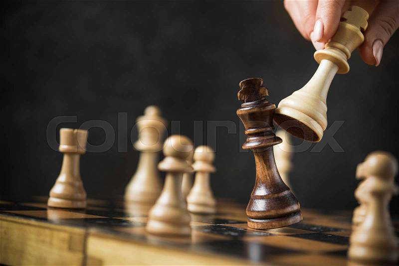 The last and winning move in a chess game. black king is defeated, stock photo