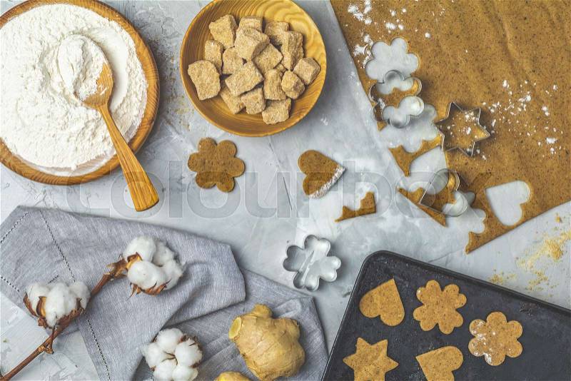 Culinary Spring or Christmas food background. Ingredients for ginger cookies. Dough for baking. View from above, stock photo