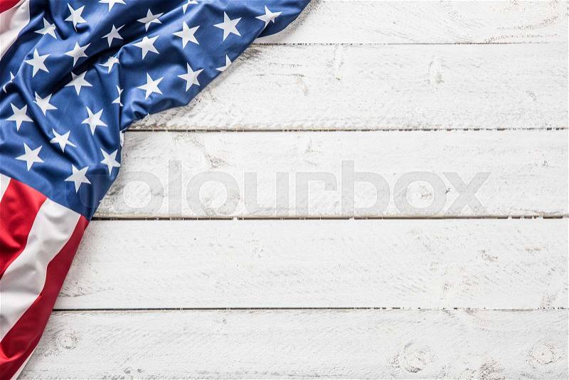 Top of view American flag on white wooden table. , stock photo
