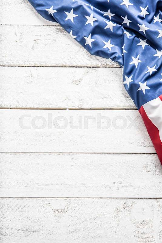 Top of view American flag on white wooden table. , stock photo