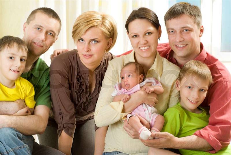 Happy family of seven people, stock photo