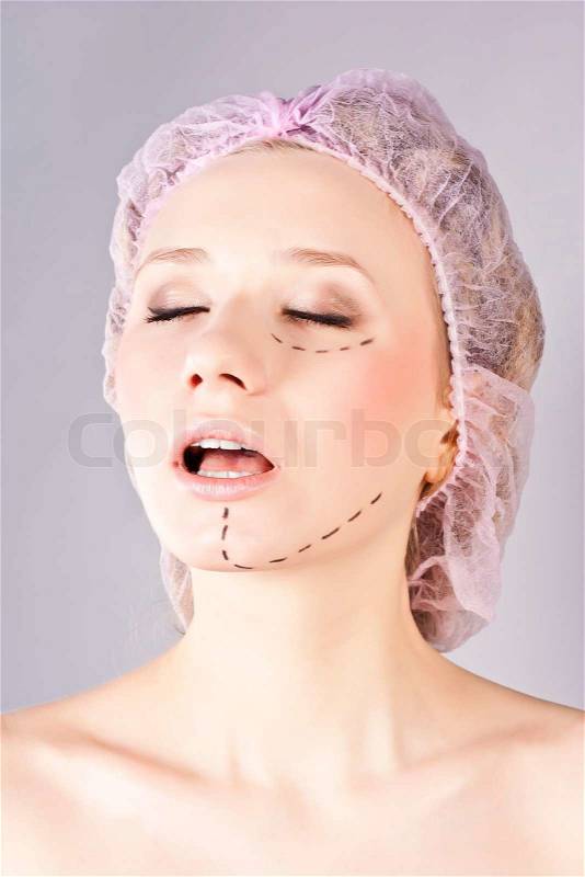 Beautiful young woman with perforation lines, stock photo