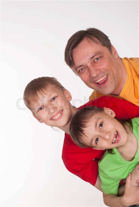 Funny dad and two sons, stock photo