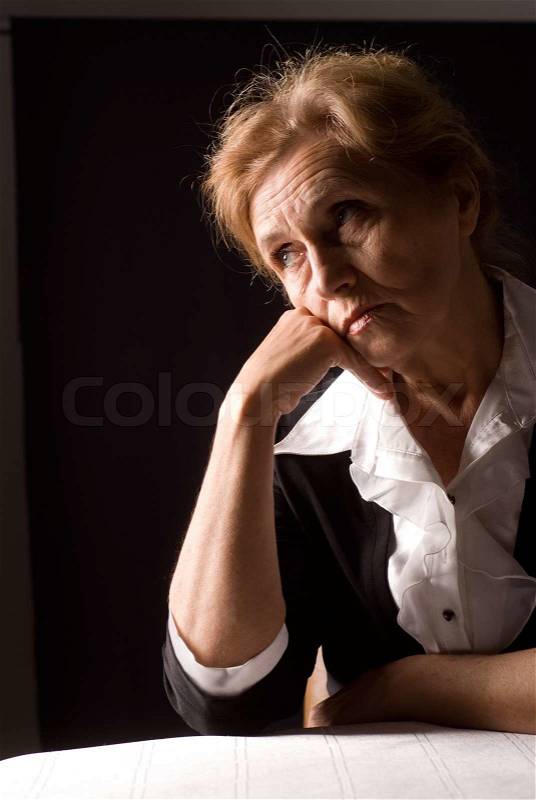 Old woman dreaming, stock photo