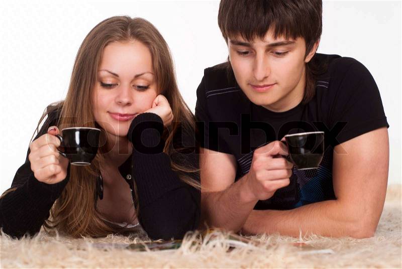 Young couple reads, stock photo