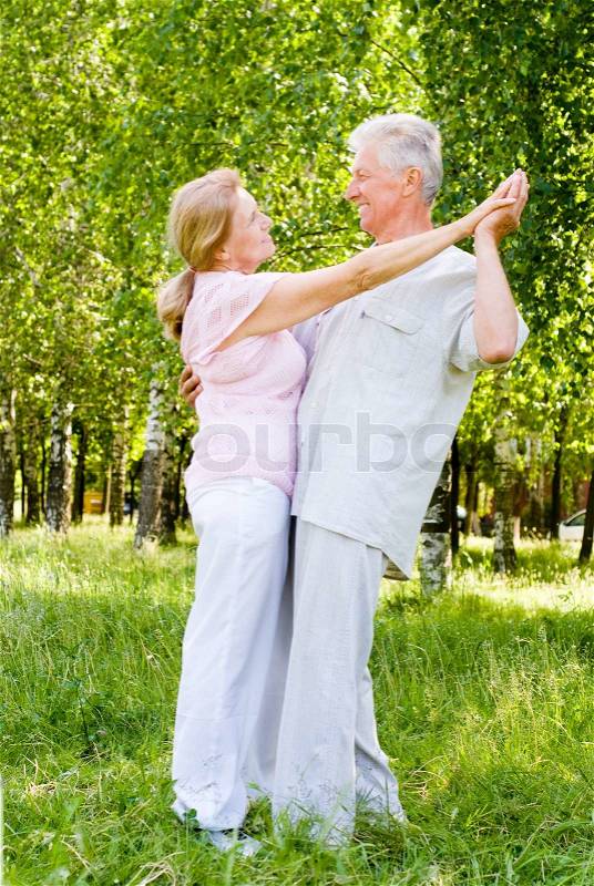 Elderly couple dance, stock photo